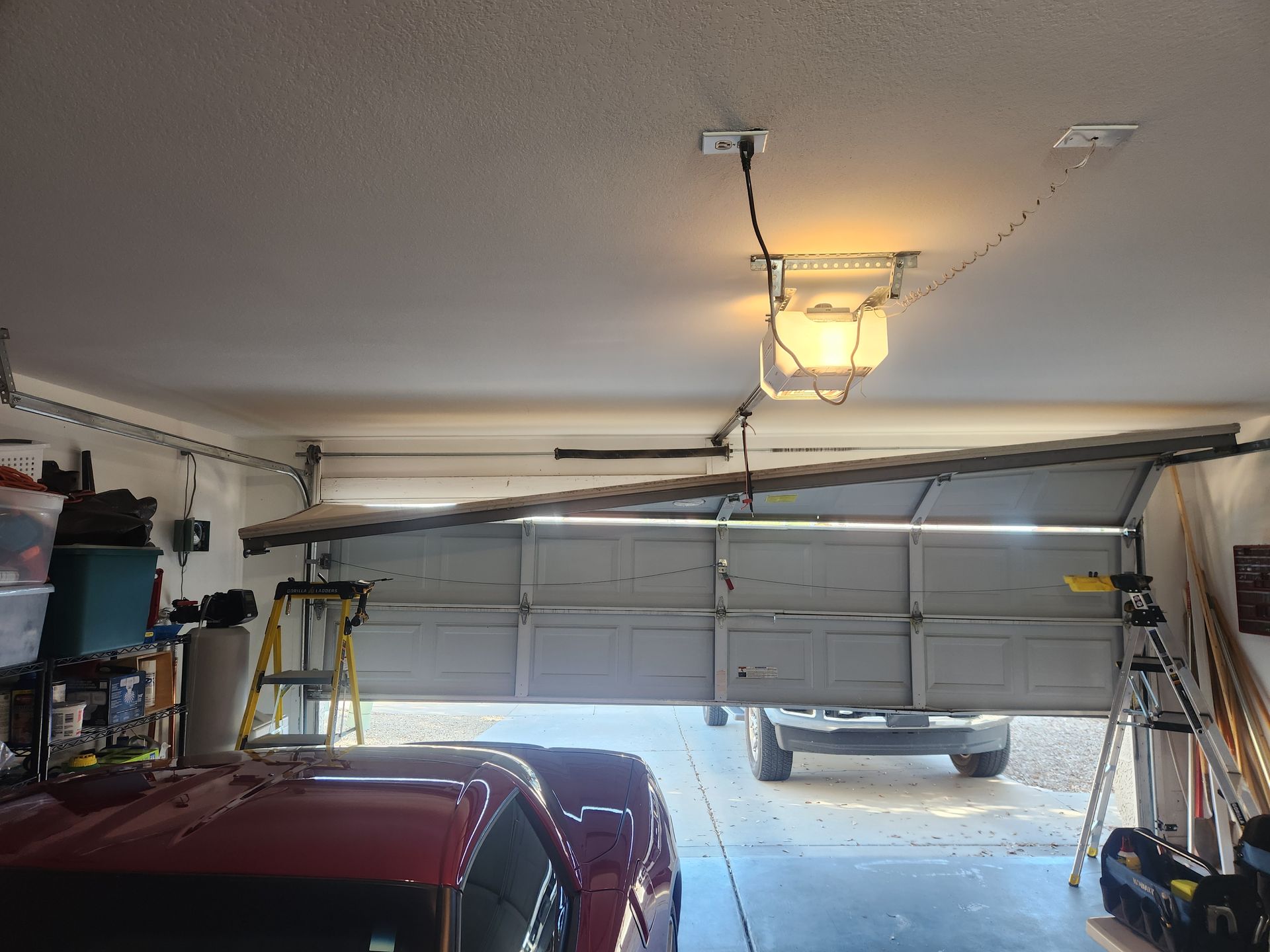 Garage door track and spring hardware